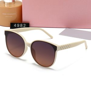 2023 Marca de moda Gafas de sol de ojo de gato Gafas de sol de diseñador Gafas de sol de metal redondas de lujo Marca para hombres Mujer Lentes de vidrio de espejo con caja y estuche