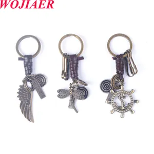 2023 Fashion vintage auto sleutel ketting handwerk weven lederen vleugel dragonfly ax charme handwerk alloeg accessoires heren sleutelhanger bc026