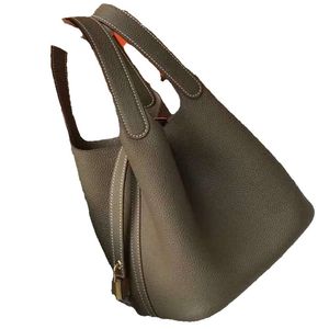 Diseño de bolso 2023, bolso sencillo, ligero y duradero, cesta de verduras de cuero hecha a mano, bolso de mano clásico de cuero de moda con diseño de Litchi
