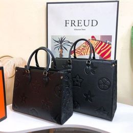 Designer Femmes Bags en relief monogrammes noirs sur le sac à main