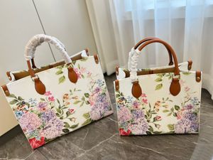 2023 Hot Designer OnThego Tote Bag Hoogwaardige Luxury Brand Handtassen Afdrukken Bloemen Empreinte Fashion Schouderleer PM MM GM On The Go -boodschappentassen M21233