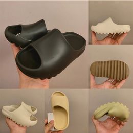 2023 Zapatos para niños Pies felices zapatillas Diapositivas de espuma de espuma de espuma
