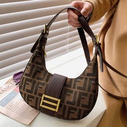 2023 Koreaanse versie trendy nieuwe Franse stick onderarmschoudermesh rode westerse stijl canvas crossbody tas