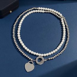 2023 joli pendentif mignon colliers de haute qualité longues perles de perles d'argent coeur anneau pendentif design collier femme avec sac à poussière et boîte