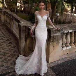 2023 Luxe arabe sirène robes de mariée Dubaï cristaux scintillants dentelle manches longues robes de mariée tribunal train jupe en tulle pailletée 229v
