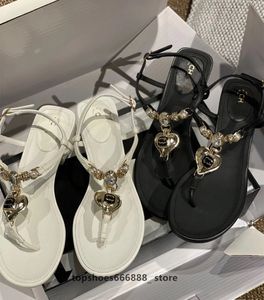 2023 Marcas de lujo Zapatillas de mujer Plataforma de moda de verano Sandalias planas diseñador tory Chanclas Chanei zapatos Playa Tacón alto Mujeres Corazón de cristal Diapositivas