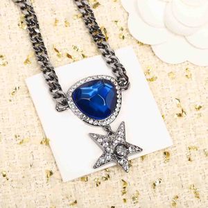 2023 Collar colgante con dijes de calidad de lujo con cristal de color azul en forma de estrella en pendiente de gota plateado con sello de caja PS7518B