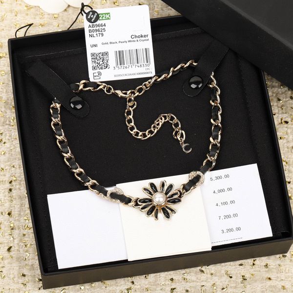 2023 collier pendentif à breloque de luxe de qualité en forme de fleur de soleil et en cuir véritable noir avec timbre de boîte PS3953