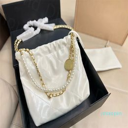 2023-Luxury Shopping Bag Designers Femmes sacs à ordures diamant Motif Gold Tone Chaîne en métal 22 Sacs à dos Designer heureux Shopping fourre-tout