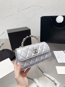 2023 Luxe schoudertas en handtas Mode echt leer compact en voortreffelijk met goed bovenlichaameffect Elegante dames Essentia designer messenger bag