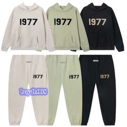 2023 Sweats à capuche pour hommes et femmes Designer de mode Essentialhoodies Survêtements de double ligne floqué 1977 Peluche Casual Set Tendance