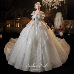 2023 Vestidos de novia de encaje modestos Dubai Árabe Sexy Apliques de encaje de tul Corte Tren Vestido de bola Vestidos de novia de boda con botones Princesa de lujo Vintage Robe de Mariee