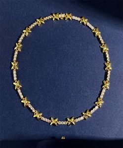 2023 nouvelle arrivée X lettre caractère collier pour femme bijoux zircon mosaïque griffe foré lisse surface métal croix Gift5116773