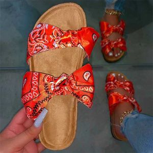2023 nouveau décontracté maison chaussures Designers femmes pantoufles diapositives plates sandales grand été plat fond arc