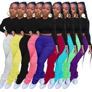 2023 nuevos pantalones de diseñador para mujer pantalones ajustados sólidos temperamento plisado micro cuerno deportes mallas largas 9 colores S-XXXL