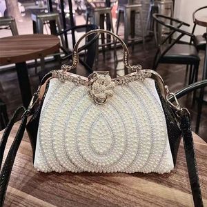 2023 nouvelles dames de mode incrustées de diamants sens avancé lumière luxe perle sac qualité décontracté bandoulière unique épaule sac à main pour les femmes