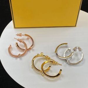 2023 nouvelles boucles d'oreilles européennes et américaines de mode personnalisées boucle d'oreille clé or et argent rose or marque boucles d'oreilles de luxe designer couples femmes mariée bijoux bo