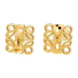 2023 Nouveau célèbre designer dames boucles d'oreilles creuses mode de luxe bijoux de haute qualité boucles d'oreilles texture en métal bijoux or et argent deux couleurs cadeau de Noël