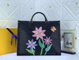 2023 nuevo diseñador de moda Bolso de mujer en relieve Flor negra Monogramas MM Bolsos Bolso de cuero Monederos Tote Hombro Crossbody Lady Mochila Bolsos negros