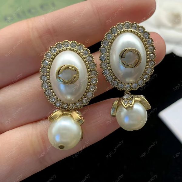 2023 Nouvelle mode perle pendentif boucles d'oreilles Charme aretes orecchini Résine laiton luxe designer boucle d'oreille pour les bijoux de cadeau de fête de mariage des femmes de haute qualité avec boîte