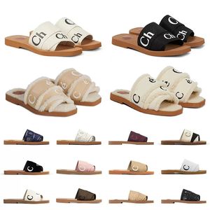 2023 Nieuwe pluizige fuzzy slipper designer Dames beroemde sandalen platte muilezelglaasjes Beige wit zwart roze letters canvas fury fury slippers huis huisschoenen sandles sandles