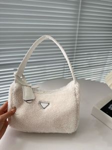 2023 Nuevo bolso Lindo y latido del corazón Pelo de cordero Pelo de conejo Material de lujo Chica de moda Bolso de corazón Bolso de hombro Bolso de diseñador de moda