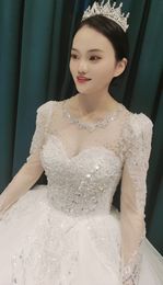 2023 Nuevo vestido de novia de mangas largas Decoraci￳n de cuentas y perlas Luxury Elegant Wedding Weddings Super Drapeados y Pastels Tiers Cristal Ruffle