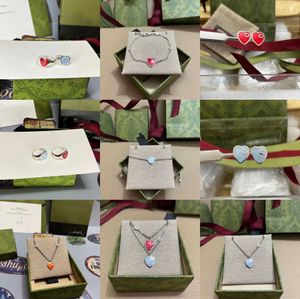 2023 Nieuwe luxe hoogwaardige mode-sieraden voor familie dubbele roodblauw hartvormige liefde ketting ring armband Emaille oorbellen
