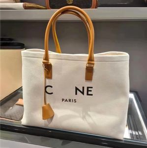 2023 nouveau Luxury Womans TRIOMPHE épaule CANVA Shandbags Shopping Stuff fashions Designer embrayage Hobo Raffias sac mens cross body voyage plage Sacs grand Tote Stuff