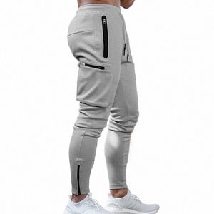 2023 Nouveaux hommes Jogging, Fitn, Pantalons de sport Pantalons multi-poches Fermeture à glissière Manteau décontracté Couleur unie Pantalon Fitn w8ZO #