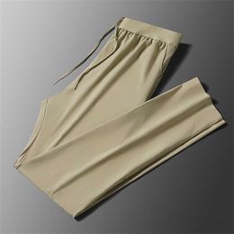 2023 nouveaux pantalons pour hommes été mince glace soie printemps séchage rapide sport tendance décontracté pour les moyens et les jeunes Menmkiamkiamhm9