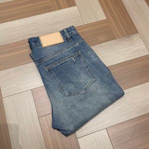 2023 Nieuwe heren stretch jeans luxe merkkwaliteit ontwerp lederen merk logo casual comfortabele denim broek