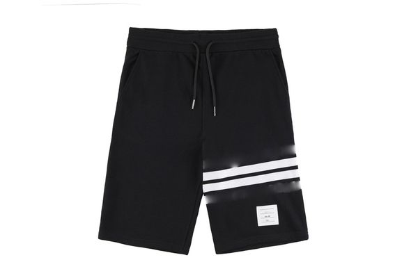 2023 nouveaux shorts pour hommes conception avancée pantalons de sport d'été pantalons décontractés pour hommes shorts décontractés pour hommes de luxe 4 lignes blanches imprimés pantalons de plage pour hommes en vrac