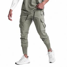 2023 Nouveaux pantalons de sport Pantalons décontractés Style mince Lâche Vitesse Dry Bouquets Foot Running Training Salopette élastique Hommes J6KJ #
