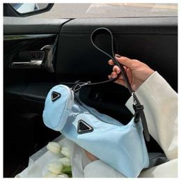 2023 novas bolsas de luxo de design superior de alta qualidade estilo coreano mensageiro de ombro sentido axila mão pop