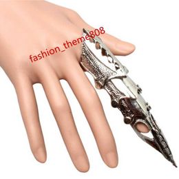 2023 Nuevo moderno Men Mujeres Punk Gothic Rock Scroll Armor Armor de nudillo Metal Cótano de dedos Finos Anillo de joyería