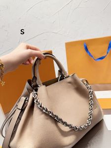 2023 new women must buy hollowed out drawstring bucket bag high-quality leather bag with arbitrary collocation can control a variety of occasions