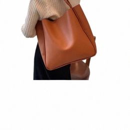 2023 Nouveau sac pour femme haute capacité en cuir sac pour femme Fi rétro sac fourre-tout de banlieue marque épaule boutique voyage q0GG #