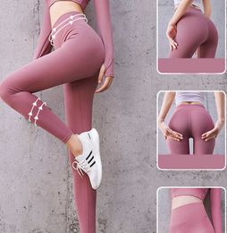 2023 Nieuwe Yoga broek Geen spoor van naaktheid Vrouwen Perzik billen Hoge Leggings Shorts taille en hoge heupen Gym Broek Houd je buik in strakke leggings