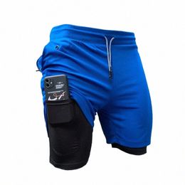 2023 Nouveaux shorts de course Hommes 2 en 1 Entraînement Gym Shorts Fitn Hommes Joggers Jogging Sports d'été Shorts d'entraînement Pantalon court E7mU #