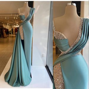 2023 Prom -jurken Arabisch sexy turquoise munt lovertjes kant diep v nek illusie kristallen kralen hoge zijde split vloer lengte satijnen zeemeermin feest avondjurken