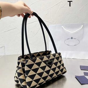 2023 Sacs à main Clearance Outlet Vente en ligne nouvelle main mince triangle tissu diamant géométrique toile simple atmosphère aisselle épaule sac pour femme