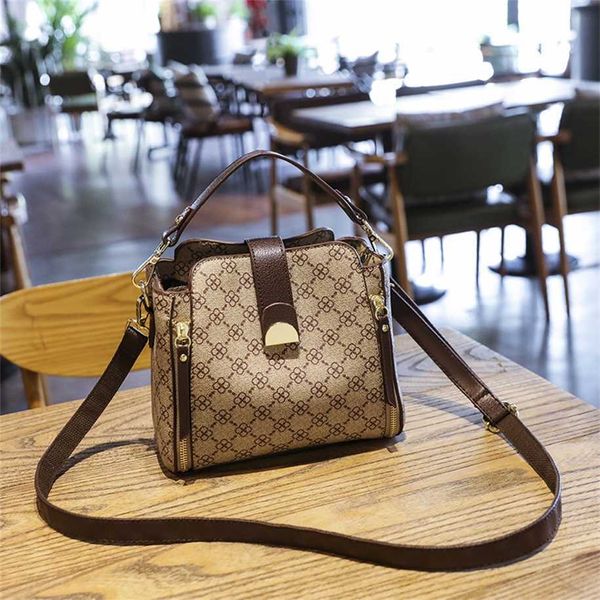 2023 Monederos Outlet de liquidación Venta en línea Bolso de mujer Nueva tendencia con asa superior Bolsos de hombro de lujo para mujer Bolsos de cuero Vintage Moda Bolsos pequeños a cuadros