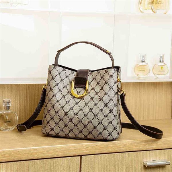 2023 Sacs à main Clearance Outlet Vente en ligne Sac à dos Sac seau femme 2023 nouvelle texture de cuir imprimé fronde une épaule légère luxe main diagonale