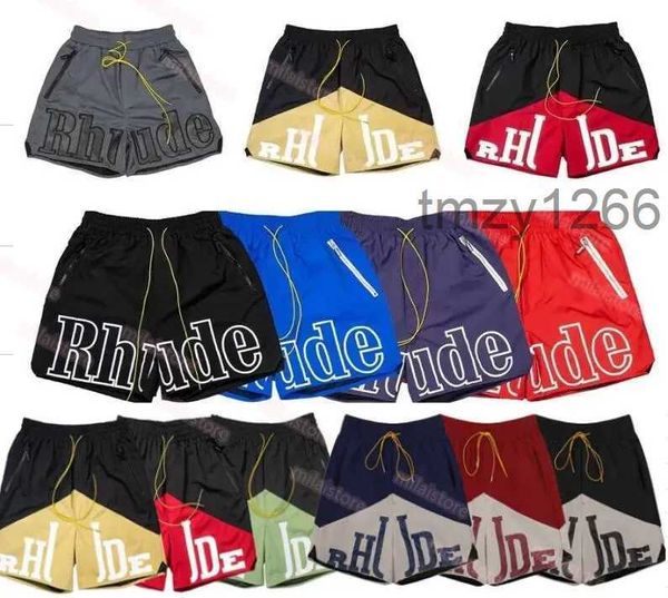 2023 Rhude Mens Mesh Shorts Moda Hombres Mujeres Casual Reflectante Skateboard Hip Hop Beach Pocket Alta Calidad Borde Blanco Corto Asiático 41JT XBRI