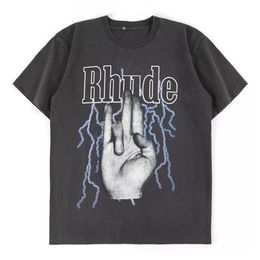 2023 Rhude Tshirt Designer Mens T-shirts Tide imprimé Tee Men Femmes Round Neck Colon Tshirt décontracté Fashion High Street Hip Hop Tjaw