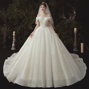 2023 sexy robe de bal arabe robes de mariée, plus la taille chérie brillante robes de mariée Bling luxe perles paillettes robes de mariée balayage train boho appliques robes de mariée