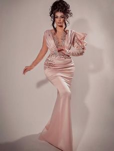 2023 Vestidos de noche de sirena sexy Use Blush Pink Árabe Manga larga Ilusión Granos de cristal Hasta el suelo Fiesta Vestidos de baile Ocasión especial Viste