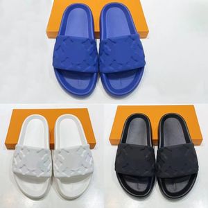 2023 Zapatillas zapatos Waterfront Embossed Mule Rubber Slide blanco azul naranja negro oliva mujeres falt sandalias Diseñador hombres zapatos de cuero