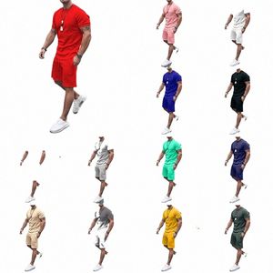 2023 Couleur unie Europe et États-Unis Hommes 13 Couleur Été Nouveau Short à manches courtes Loisirs Sports Suit Hommes o19s #